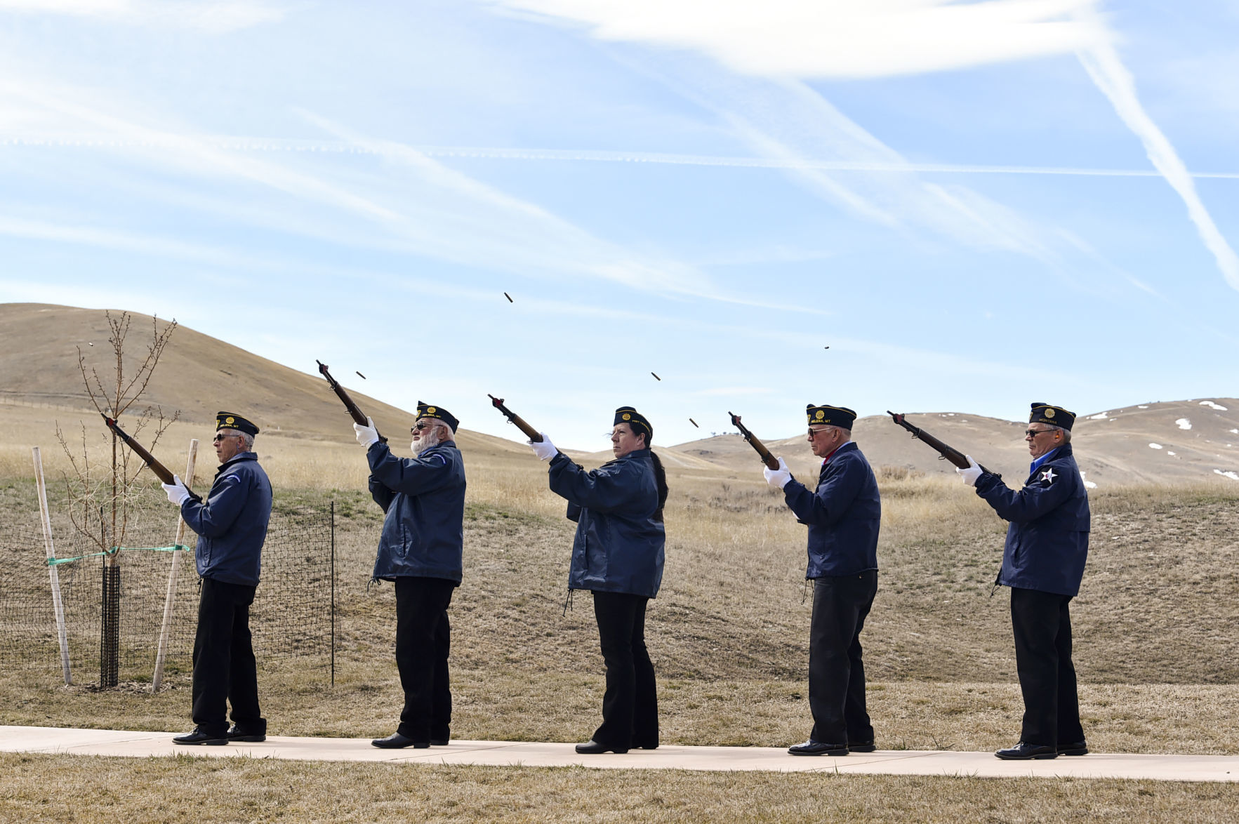 The Lewis and Clark Veterans Council honor guard fires three volleys